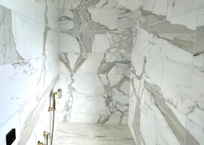 PYRAMID - 12x24 Calacatta Gold marble mosaic withsloped ceiling