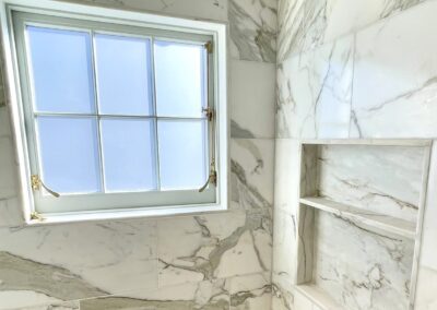 PYRAMID - 12x24 Calacatta Gold marble mosaic withsloped ceiling